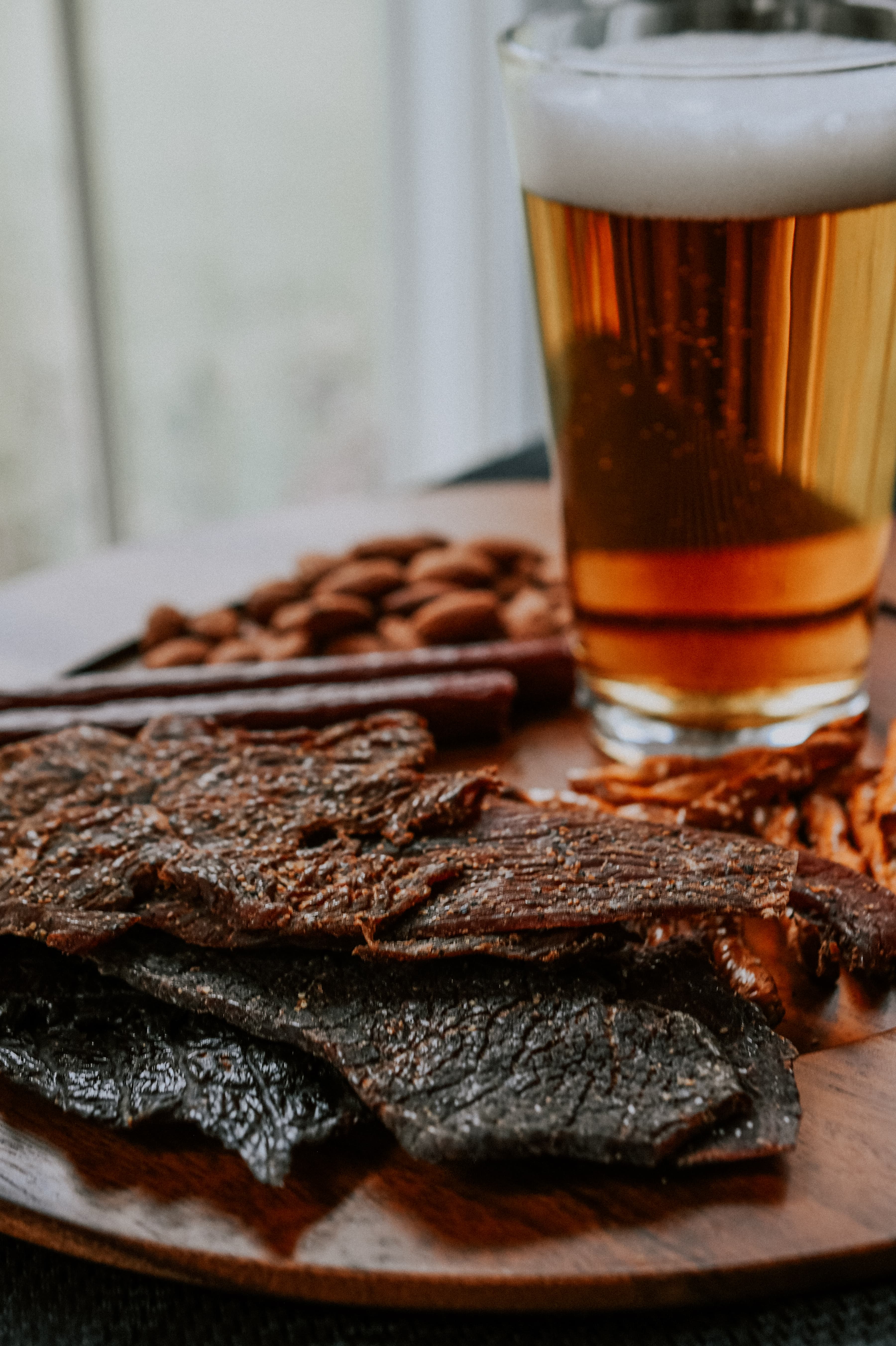 Jerky Sticks with snacks and beer